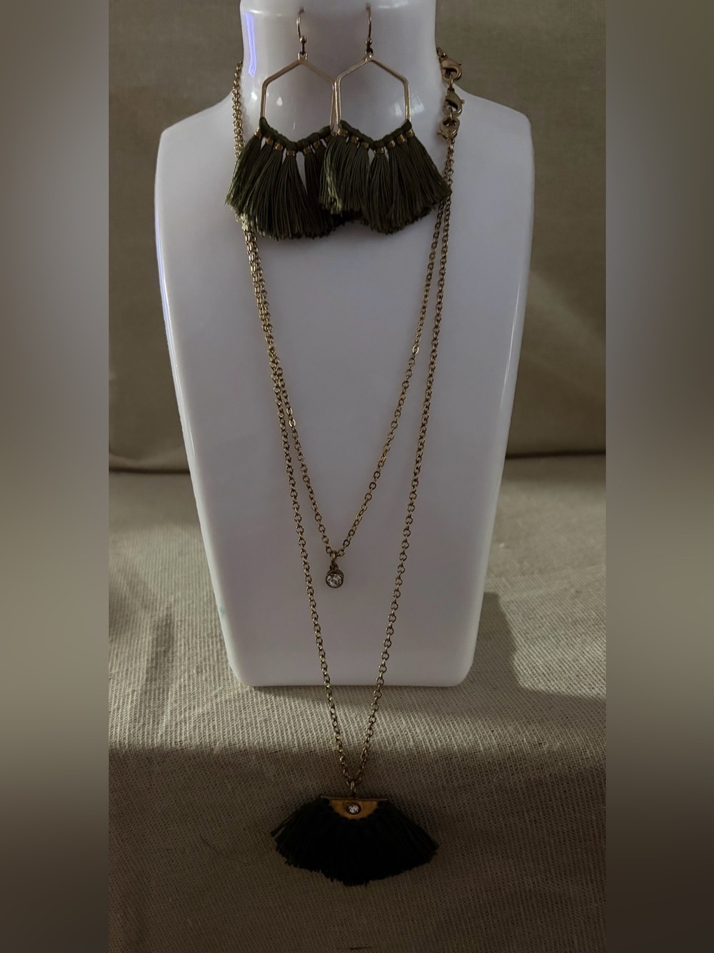 Layered Gold-Tone Necklace with Olive Tassel Accent and Matching Earrings